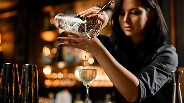 Bartender pouring a drink