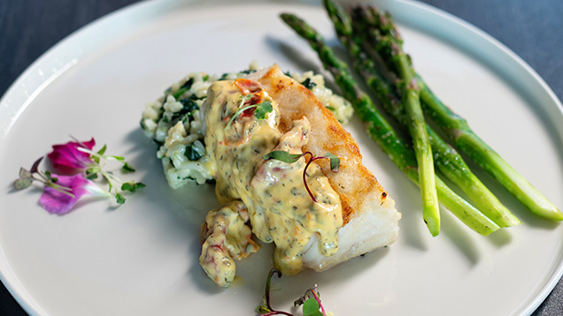 Plated fish and asparagus